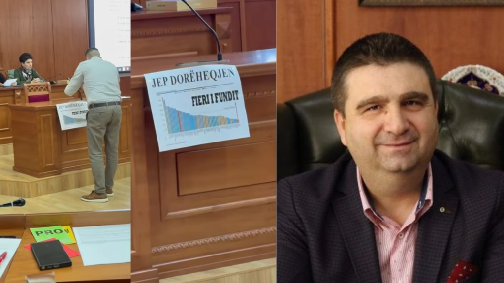 Endri Jaupaj vendos posterin “Jep dorëheqjen, Fieri i fundit” në sallën e këshillit Endri Jaupaj vendos posterin “Jep dorëheqjen, Fieri i fundit” në sallën e këshillit